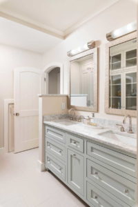 Master bath with 2 sinks and 2 mirrors