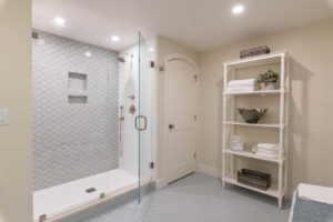 Bathroom with tiled walk in shower